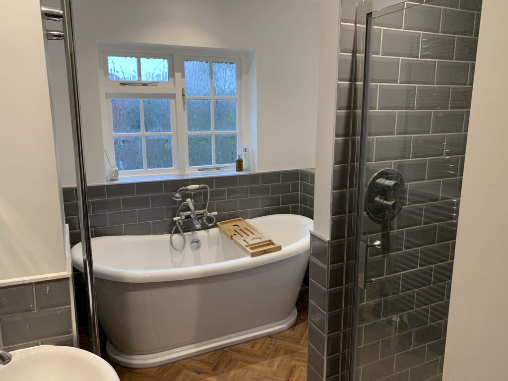 Bathroom renovation with the bath tub in view