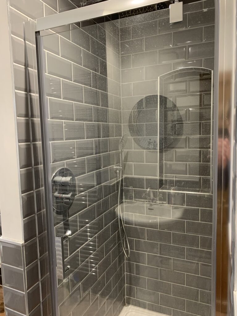 Newly renovated bathroom with the shower in view