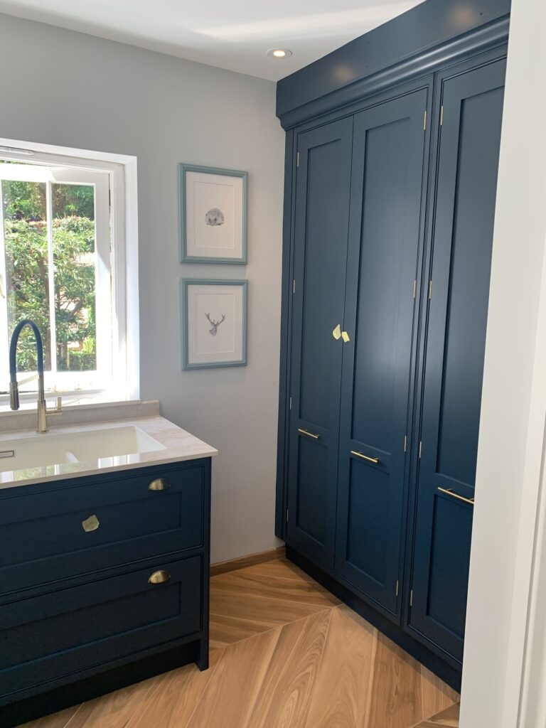 Utility floor to ceiling height cupboards