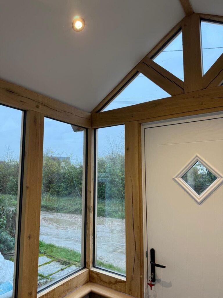 An image of the oak frame and glazing from inside the porch